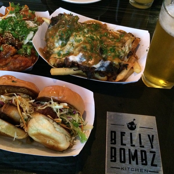 Photo taken at Belly Bombz Kitchen by G on 12/9/2014