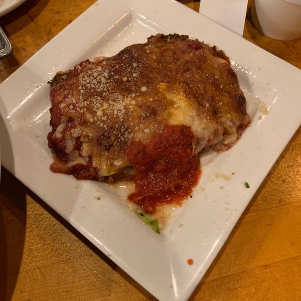 Chicken parmigiana - lightly breaded and baked with marinara and cheese , on a bed of spaghetti (on the side and not pictured). #charliegittosdowntown Follow us at http://24hourfoodgeek.com
