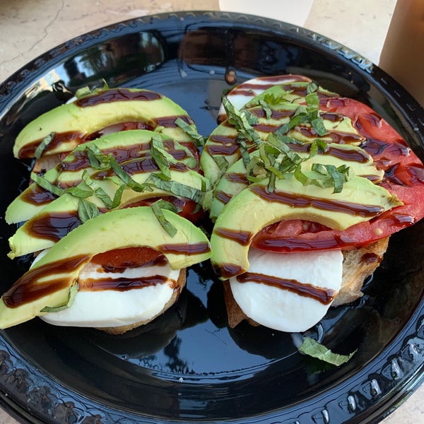Avocado toast - avocados, tomatoes, mozzarella cheese, basil, topped with balsamic and served on French rustic batard. #citycoffee #24hourfoodgeek Follow us at http://24hourfoodgeek.wordpress.com