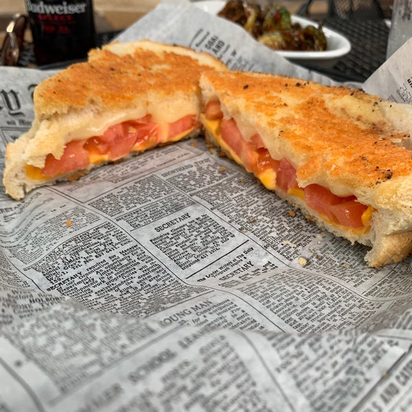 Molly’s grilled cheese - American, provolone, white cheddar, and tomato on Parmesan crusted brioche. #mollys #24hourfoodgeek Follow us at http://24hourfoodgeek.com