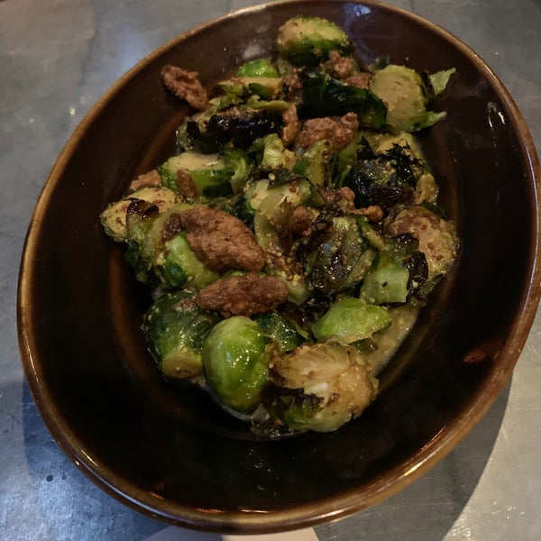 Brussel sprouts - mustard and candied walnuts. #bassostl #24hourfoodgeek Follow us at http://24hourfoodgeek.com