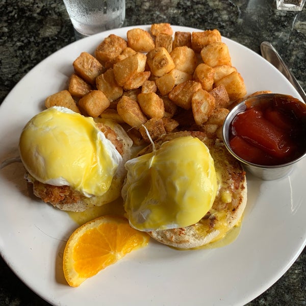 Eggs Benedict - poached eggs, ham, on a toasted English muffin and topped with hollandaise sauce.  #wildflowerstl #24hourfoodgeek. Follow us at http://24hourfoodgeek.wordpress.com