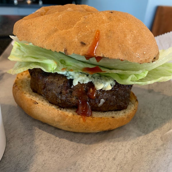 Steakhouse burger - premium steak burger, gorgonzola blue cheese,  iceberg lettuce, (no) onion rings, steak butter, and steak sauce on Dave’s original bun.  #24hourfoodgeek