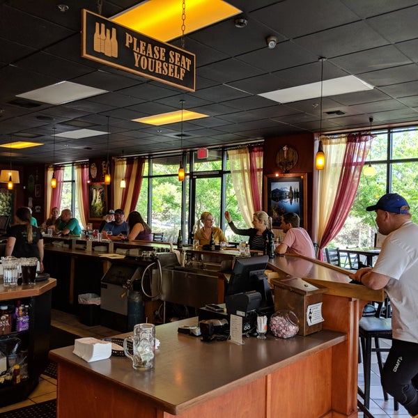 Photo taken at Broken Top Bottle Shop &amp; Ale Cafe by Marc T. on 5/19/2018