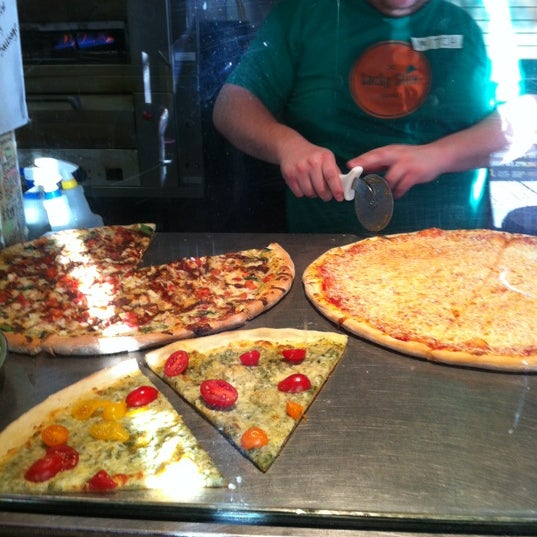 Foto diambil di Lucky Slice Pizza oleh Tyson S. pada 10/20/2012