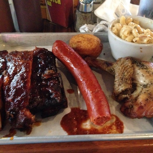 Photo taken at Smoking Pig BBQ by Daryl C. on 4/20/2014