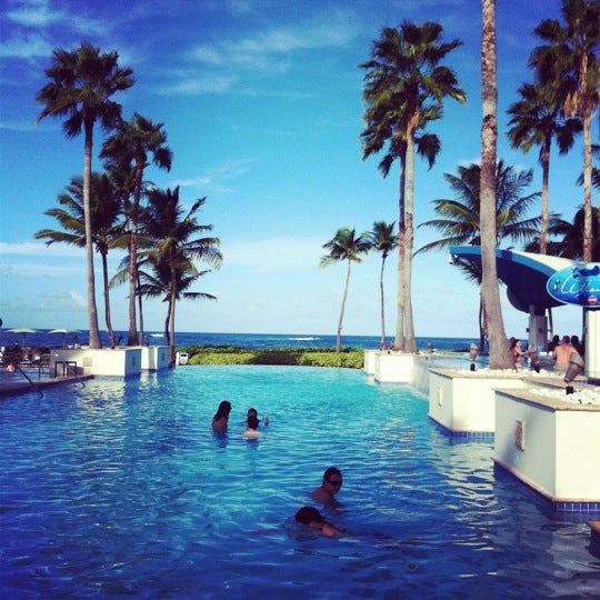 Photo taken at Condado Lagoon Villas at Caribe Hilton by Teresa W. on 10/14/2012