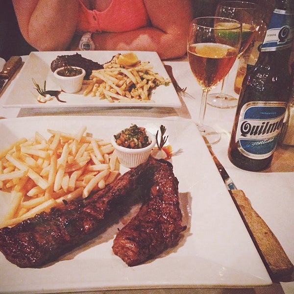 Photo taken at New Campo Argentino Steakhouse by Martijn K. on 5/14/2014