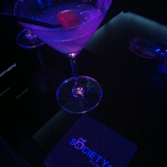 Photo taken at Society+ Bar &amp; Lounge by Andrean H. on 12/26/2012