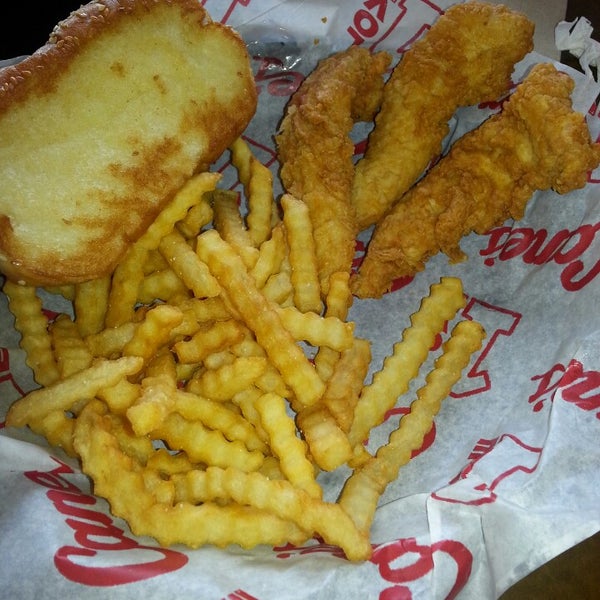 Photo taken at Raising Cane&#39;s Chicken Fingers by Jake L. on 6/17/2013