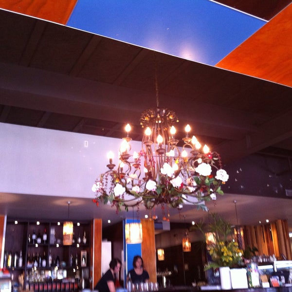 Photo taken at Southern Cross Garden Bar Restaurant by RT on 4/5/2015
