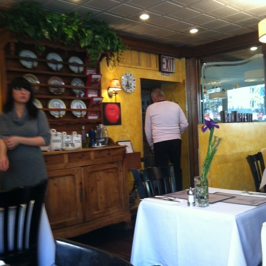 Photo taken at Mon Petit Café by Phil D. on 11/23/2012