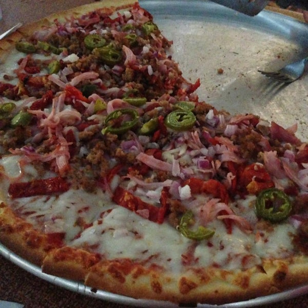 8/31/2013 tarihinde Alexis H.ziyaretçi tarafından Hideaway Pizza'de çekilen fotoğraf