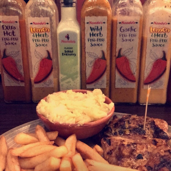 Photo taken at Nando&#39;s by G on 12/15/2017