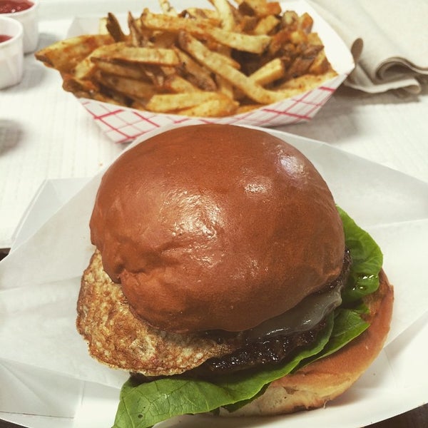 Photo taken at Konjoe Burger by Richard L. on 3/31/2015