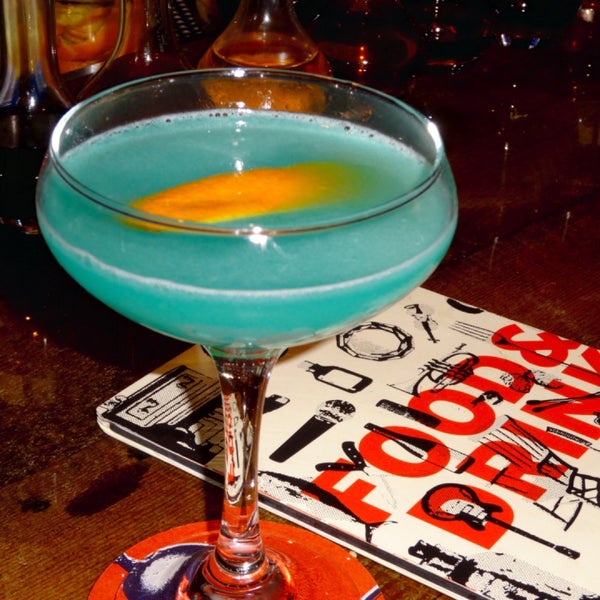 Gun Metal Blue (mezcal, curacao, peach brandy) looks and tastes like what would happen if the Caribbean were smoked over hickory and finished with a squeeze of lime.