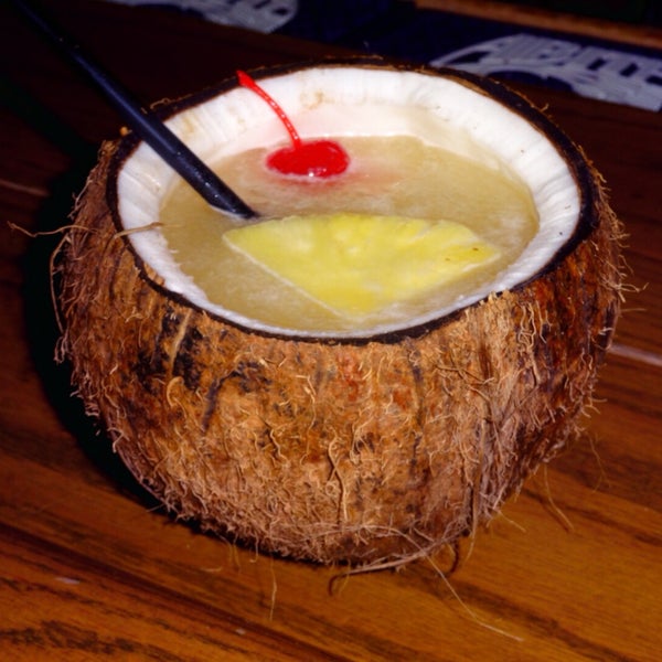 Drunken Coconut - Appleton Gold Rum, Malibu, fresh coconut water & pineapple juice served in a coconut
