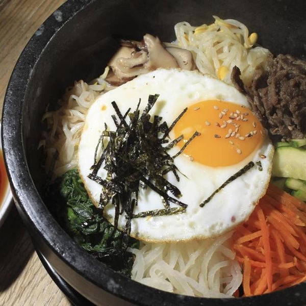 Bibim serves a terrific bibimbap in a stone pot ($13.50), the stellar Korean dish of rice topped with carrots, shredded beef, rice noodles, sprouts, and an egg. You’ll eat in silence — and awe.