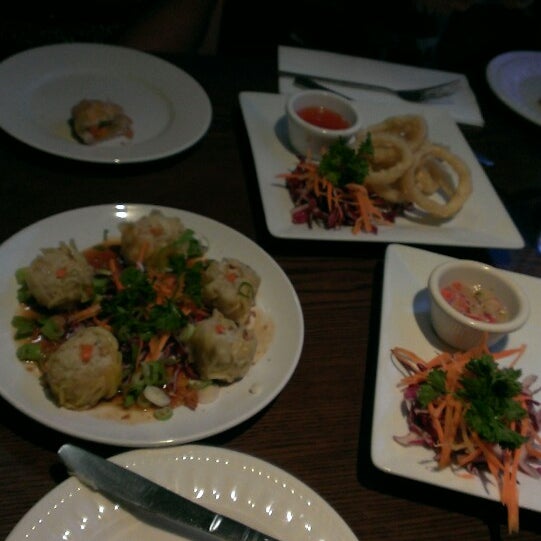 Photo taken at Charm Thai Restaurant by Larry J. on 8/24/2013