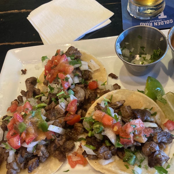 Averageish gastropub thing with pliny the elder on draft ($8/10oz.) and good steak tacos