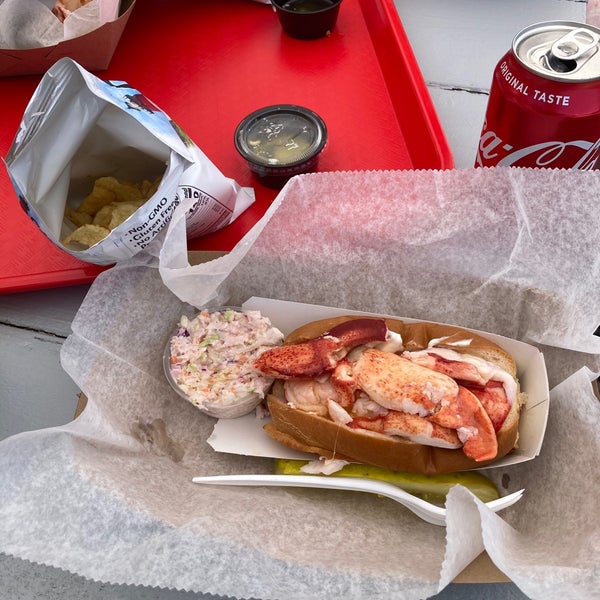 delicious lobster rolls and a great location. The lobster roll comes with a swipe of mayo by default but they give you melted butter to pour over it too