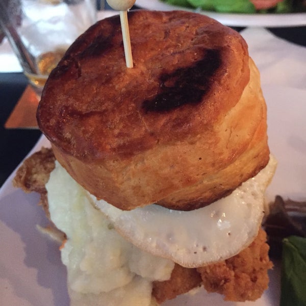 Decent fried chicken sandwich has mashed potatoes on it