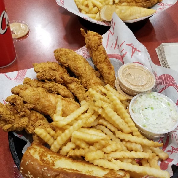 Photo taken at Raising Cane&#39;s Chicken Fingers by Greg C. on 6/26/2019