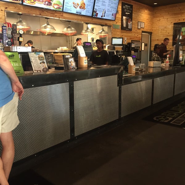 Photo taken at BurgerFi by Abinh on 4/8/2016