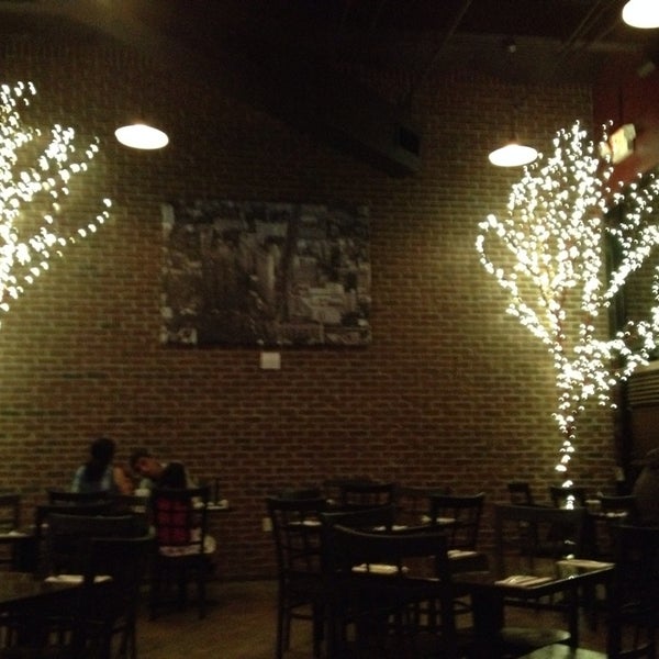 Photo taken at Goodfella&#39;s Woodfired Pizza Pasta Bar by Winter M. on 4/1/2014