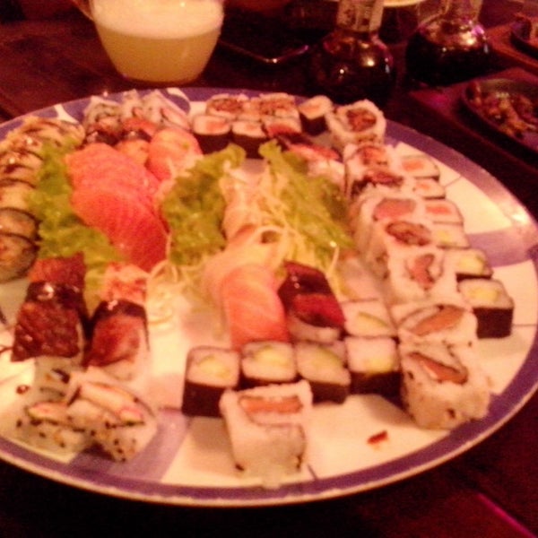 Photo taken at Sushi Los Ruas by Madgirl N. on 1/4/2014