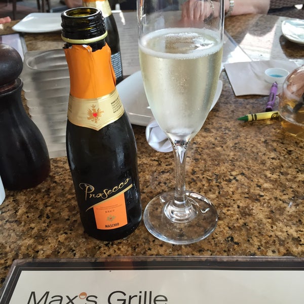 Photo taken at Max&#39;s Grille by Christine K. on 4/22/2015