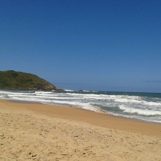 Photo taken at Praia da Silveira by Lorena F. on 10/14/2012