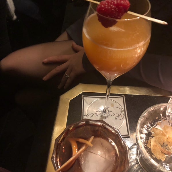 I forgot the name but the cocktail on the bottom of the photo was a great strong one!