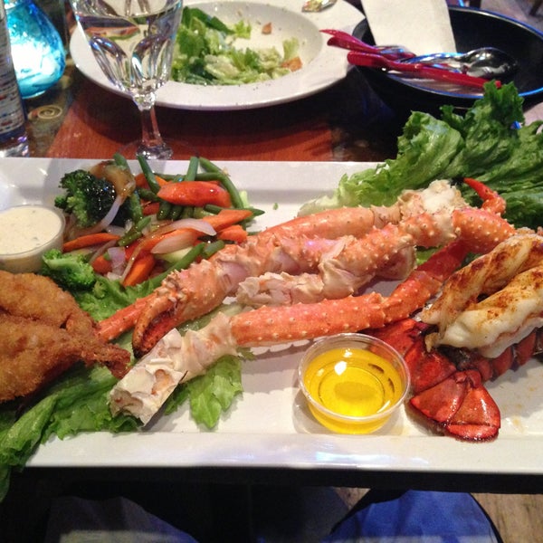 Photo taken at King Crab Tavern &amp; Seafood Grill by Joey R. on 4/23/2013