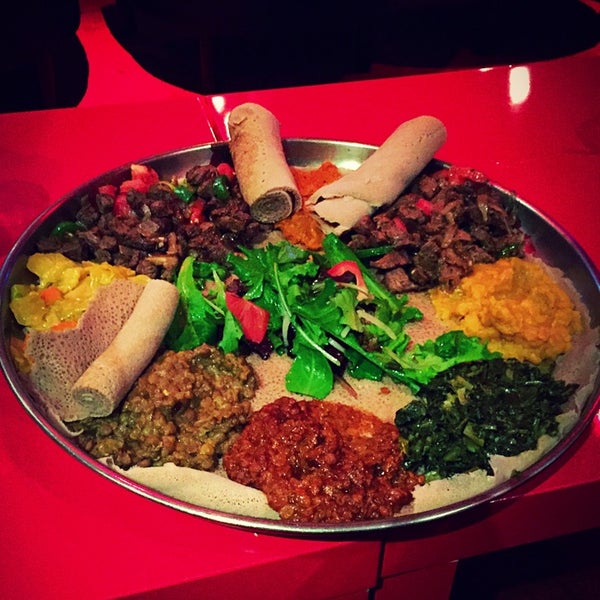 Photo taken at Lucy Ethiopian Restaurant &amp; Lounge by Christin D. on 11/22/2014