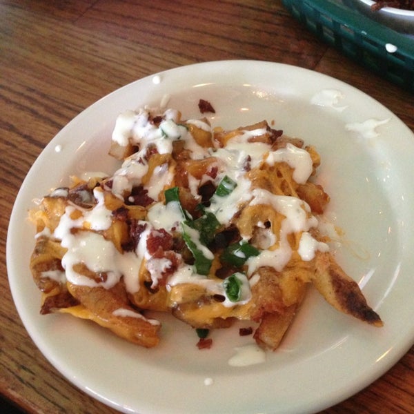 Photo taken at Snuffers by Meghan G. on 3/20/2013