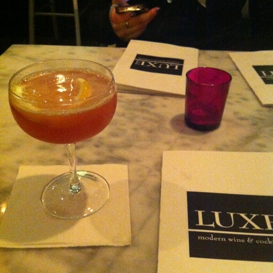 Photo taken at LUXE Modern Wine &amp; Cocktails by Kirstin S. on 12/14/2012