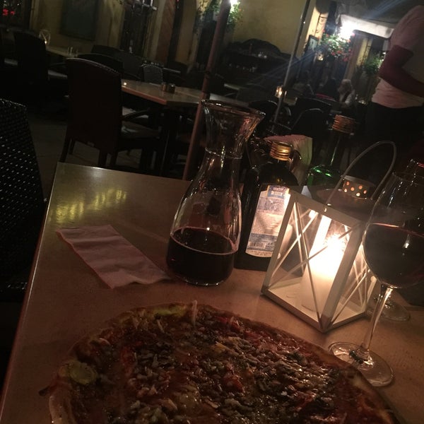 The Pizza is just amazing. crispy. fruity. juicy. huge! also the pasta is home-style-tasty! try the Lambrusco vino:)))) you will love it