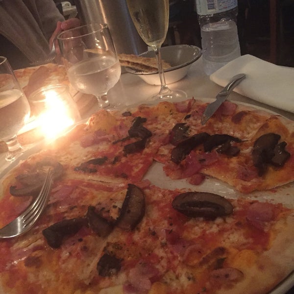 the food is real italian style. pizza is super. thin, crispy and not overloaded. waitresses very attentive. better reserve a table when go for dinner!