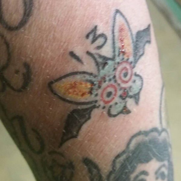 Bazooka Tooth Tattoo Downtown Evansville 1 tip from 29 visitors