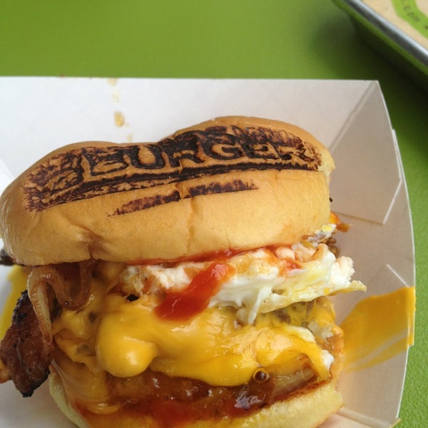Photo taken at BurgerFi by Alyse D. on 5/18/2013
