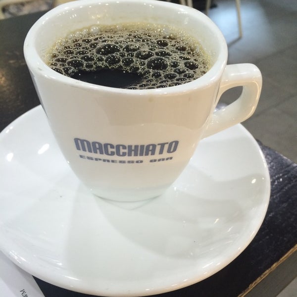 Photo taken at Macchiato Espresso Bar by Steve P. on 8/21/2014