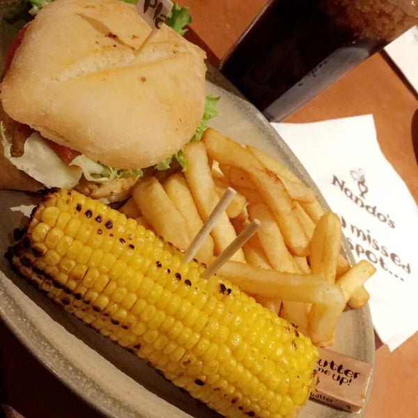 Photo taken at Nando&#39;s by AyoOo7a A. on 5/23/2016