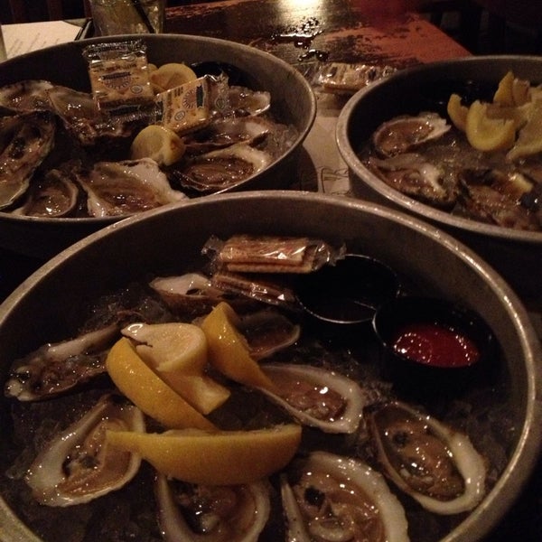 Photo taken at Doc Magrogan&#39;s Oyster House by Melissa R. on 9/23/2013