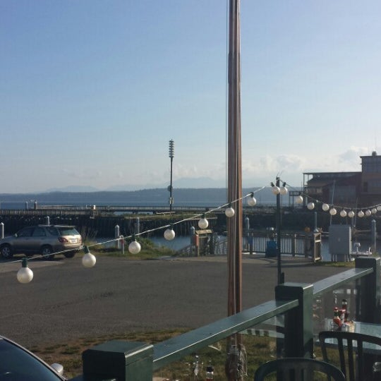Photo taken at Doc&#39;s Marina Grill in Port Townsend by Brandie M. on 5/8/2014