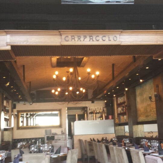 Foto diambil di Carpaccio ristorante italiano oleh lee pada 7/25/2013