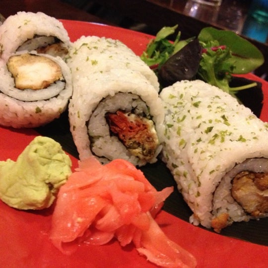 Photo taken at Sushi Ninja by Nicole M. on 12/8/2012