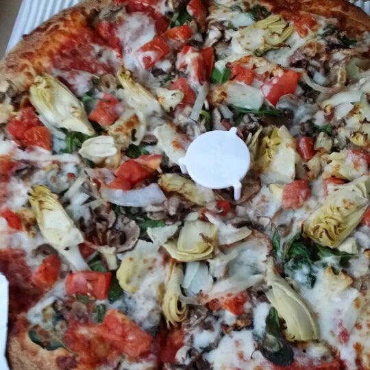 Photo taken at Seniore&#39;s Pizza by Maya C. on 3/15/2014