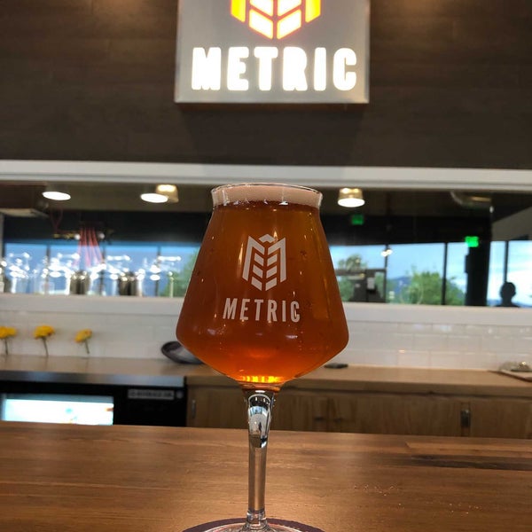 Photo taken at Metric Brewing by Ethan L. on 7/7/2019