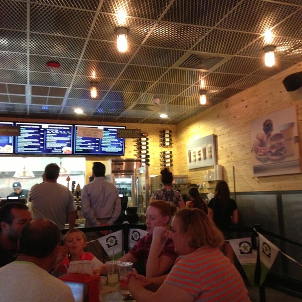 Photo taken at BurgerFi by silvia on 8/7/2013